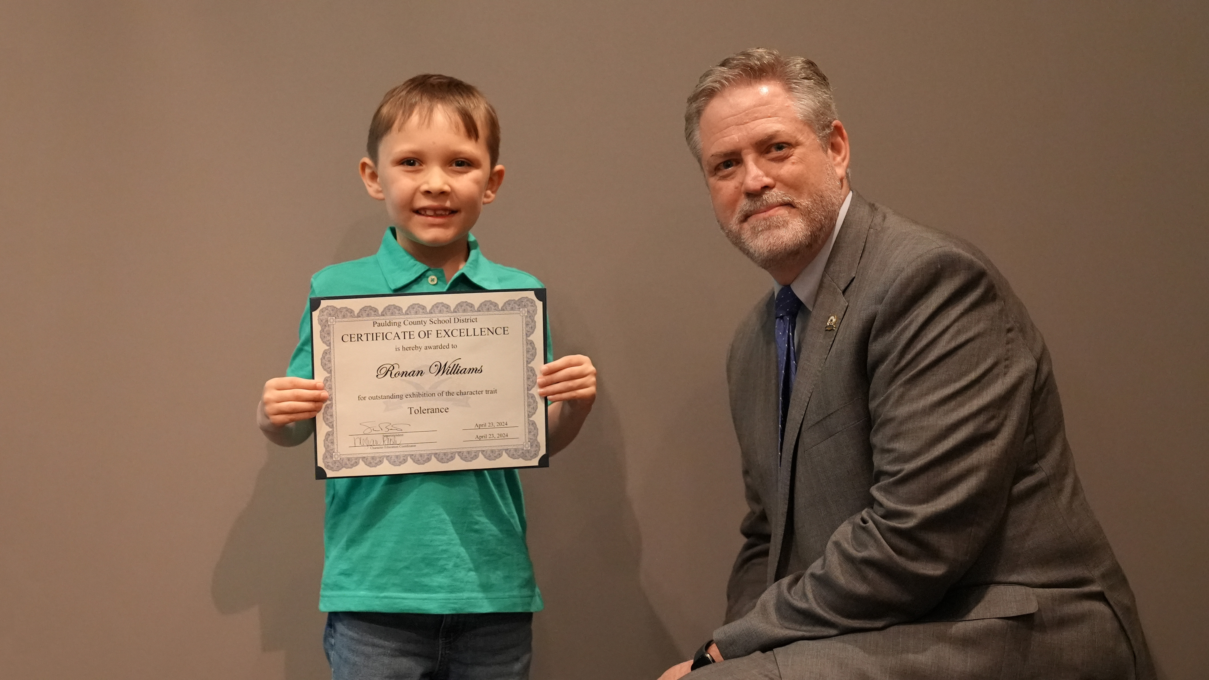 Superintendent Steve Barnette pictured with Character in Action (Tolerance) winner Abney ES Kindergartener Ronan Williams.